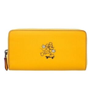 Disney x Coach Mickey Mouse Skateboard Yellow Leather Accordion Zip Wall…